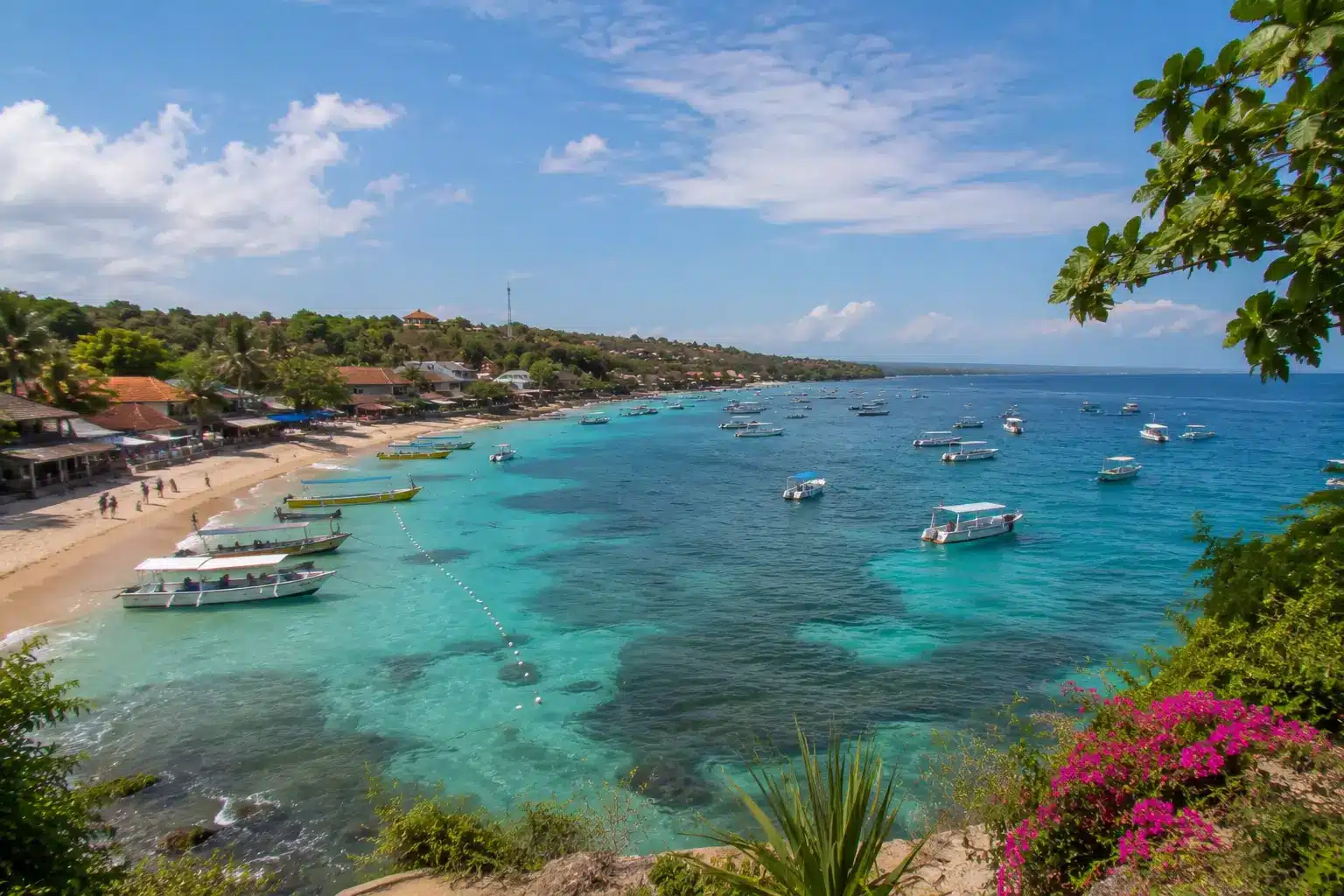 Turquoise bay and coastal village in Nusa Lembongan Bali